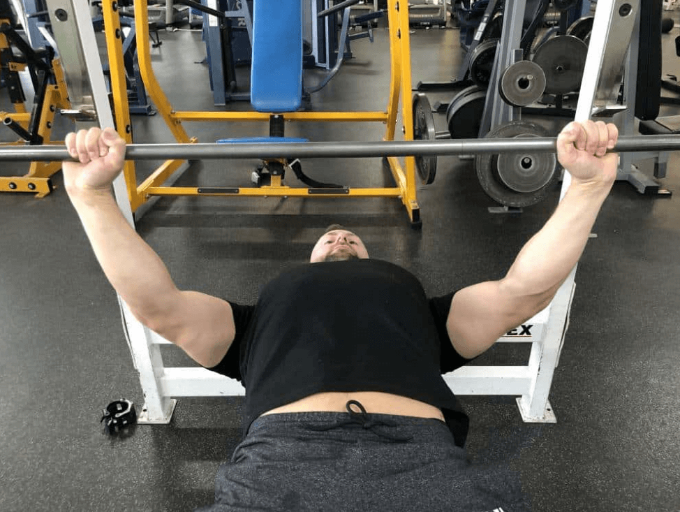 How should I do the close grip bench press exercise for maximum gains