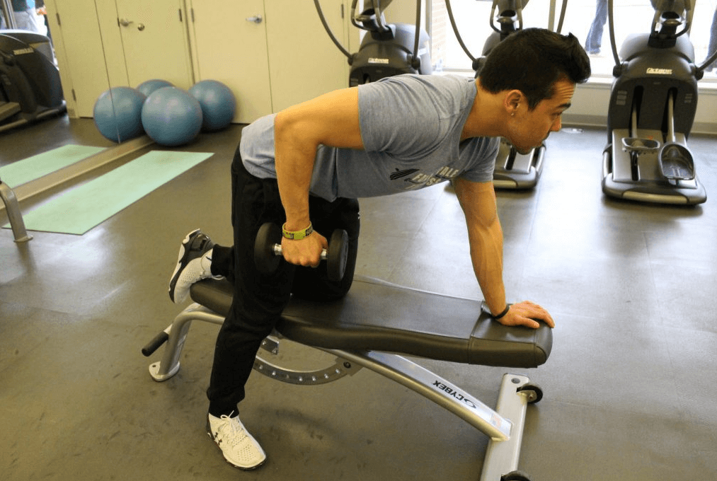 The dumbbell tricep kickback can be done easily when sitting on a bench provided you know what to do