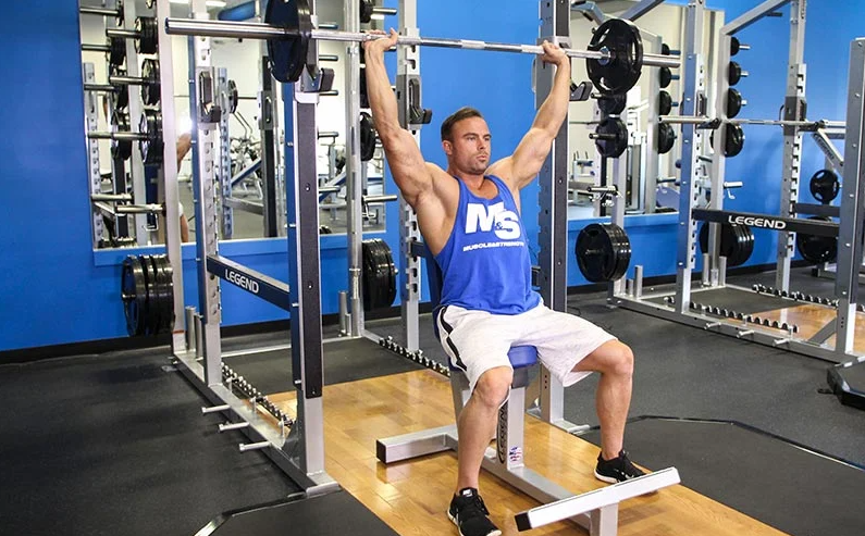 The Seated Barbell Shoulder Press Is one of The Variations of the Military Press