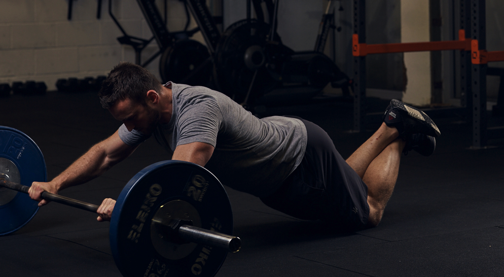 heavy barbell rollout exercise for building abs