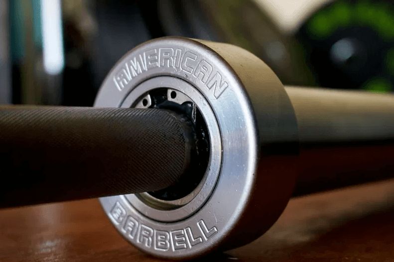 The American Barbell Stainless Bearing Bar is another great option when looking for barbells that are less likely to bend