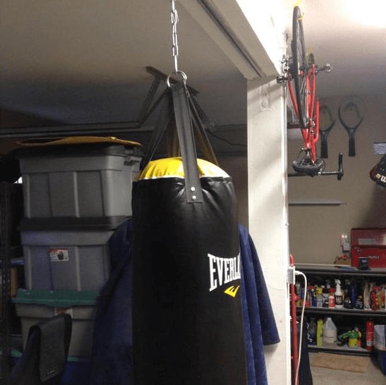 Hanging a punching bag on dry ceiling can be challenging without the right gear