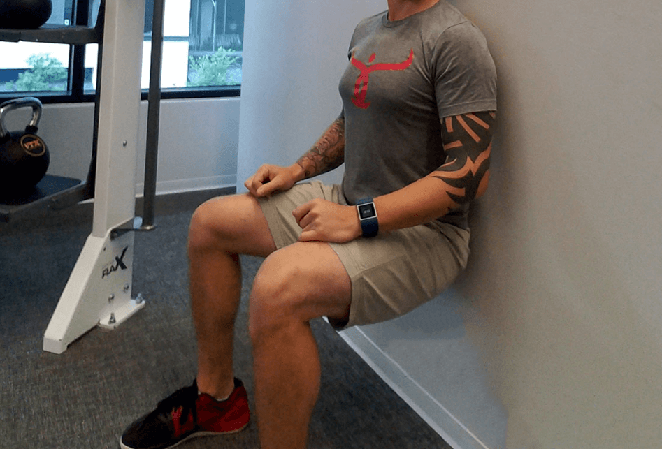 Wall sit exercise will help you burst through more sets of squats