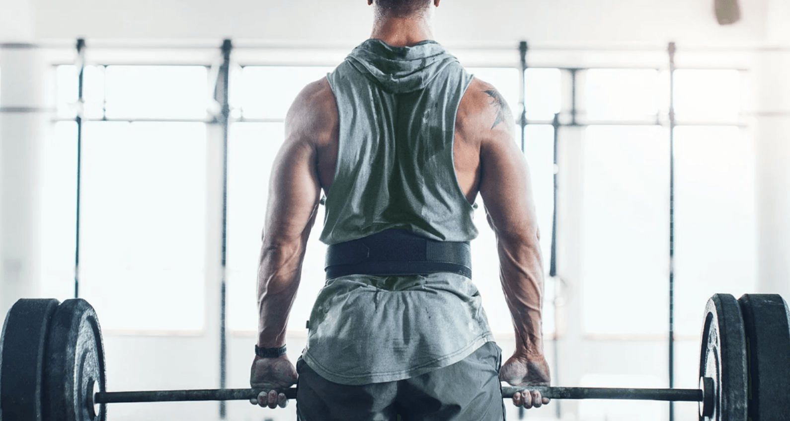 Here's how you can use a weightlifting belt when performing deadlifts